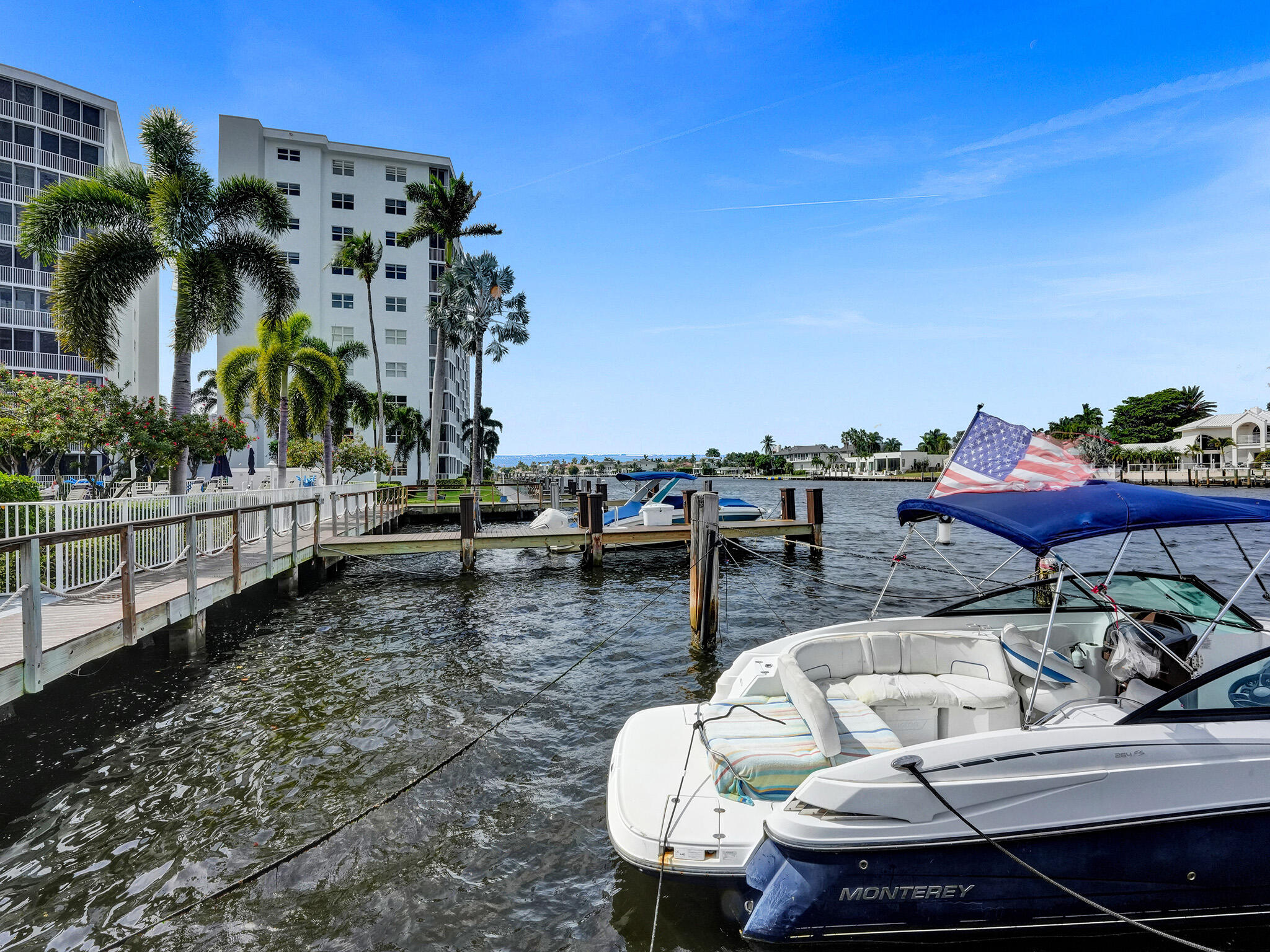 3300 South Ocean Boulevard, Unit 1021C Highland Beach, FL 33487 - Photo 35 of 45 a terrace with outdoor seating and city view