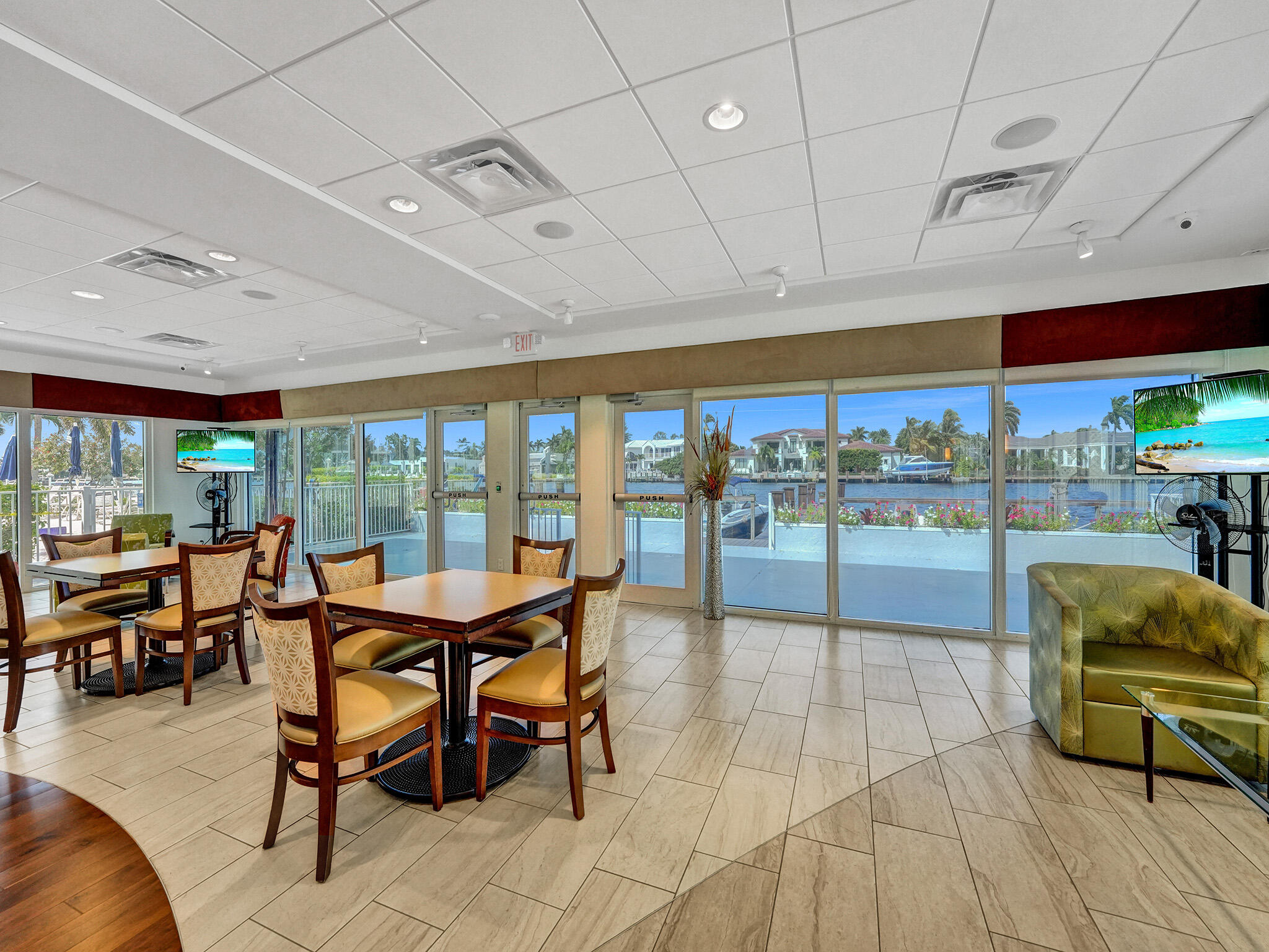 3300 South Ocean Boulevard, Unit 1021C Highland Beach, FL 33487 - Photo 41 of 45 a dining room with furniture and a floor to ceiling window