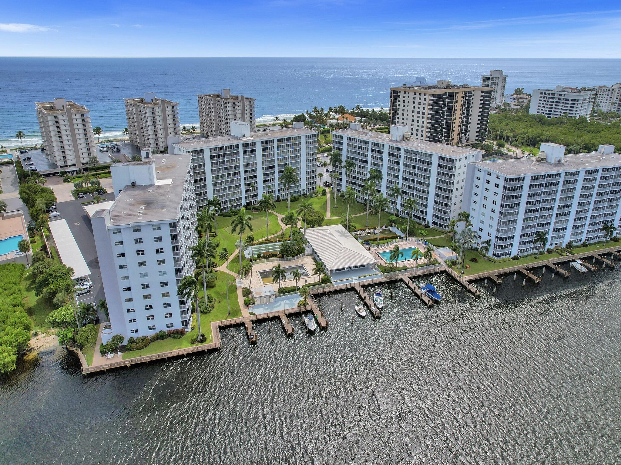 3300 South Ocean Boulevard, Unit 1021C Highland Beach, FL 33487 - Photo 44 of 45 a bench sitting in front of a building