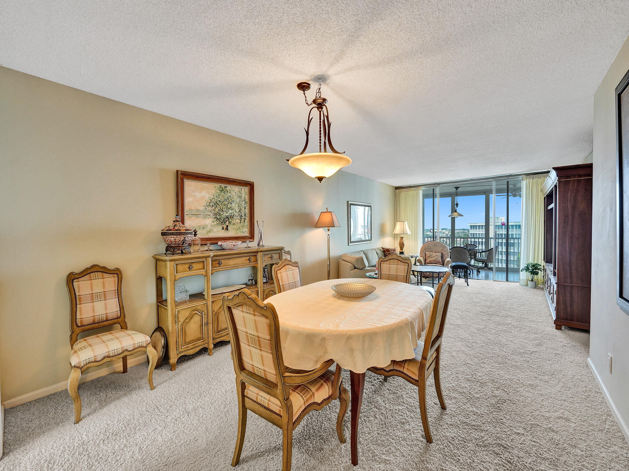 3300 South Ocean Boulevard, Unit 1021C Highland Beach, FL 33487 - Photo 9 of 45 a view of a dining room with furniture and window
