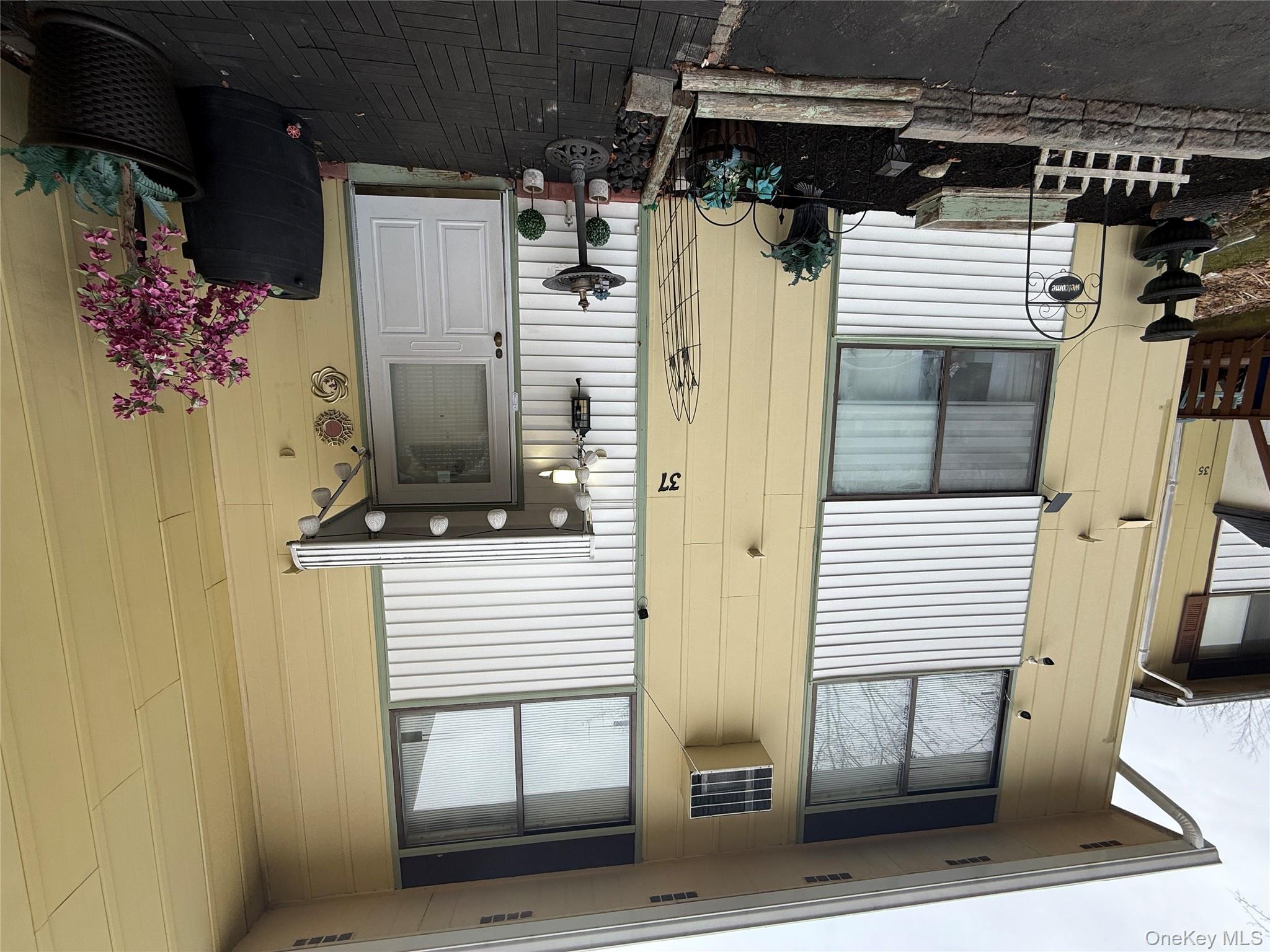 a front view of a house with a garage