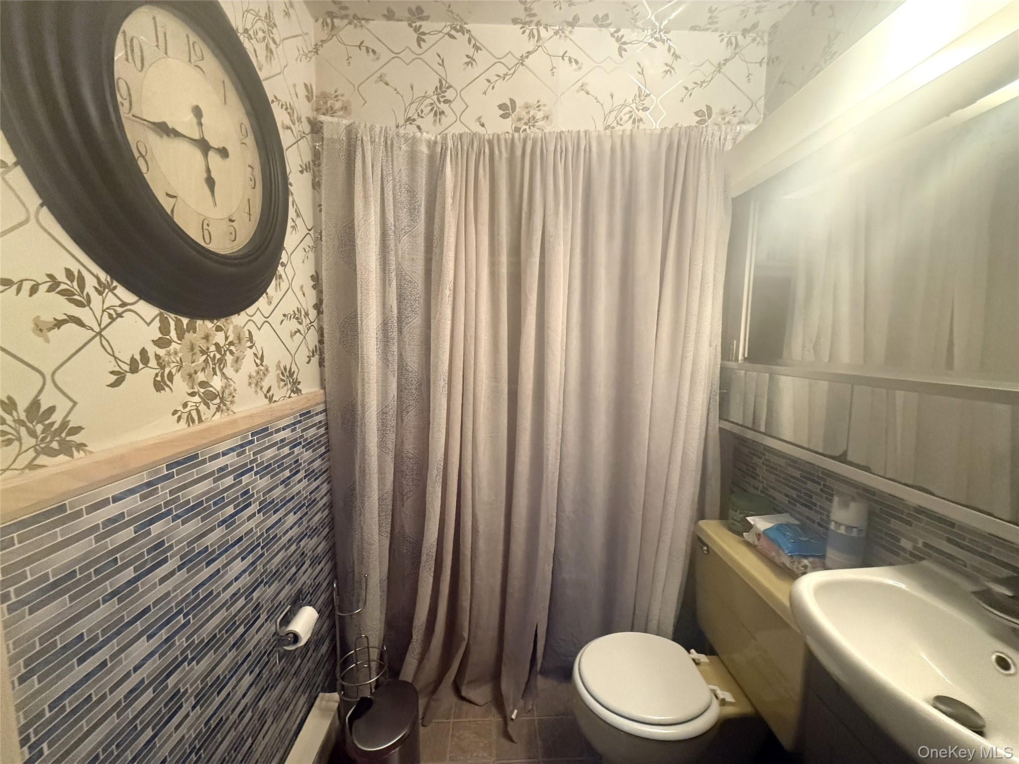 37 Robert Road Kiamesha Lake, NY 12751 - Photo 15 of 25 a bathroom with a toilet and a sink