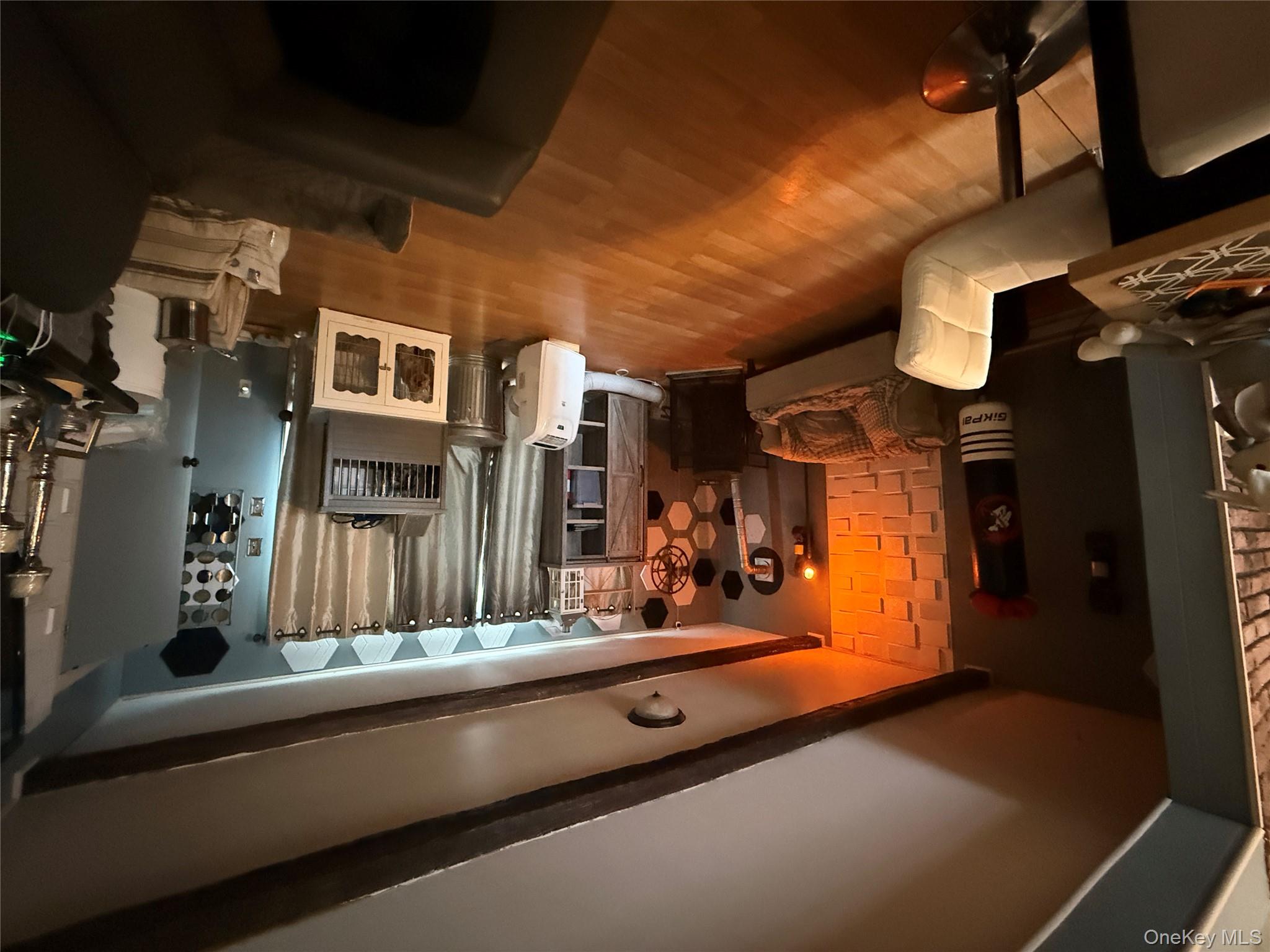 37 Robert Road Kiamesha Lake, NY 12751 - Photo 20 of 25 a living room with furniture and a flat screen tv