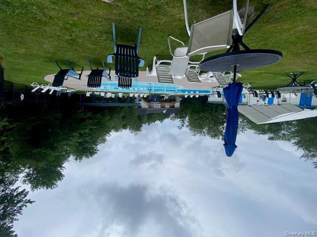 37 Robert Road Kiamesha Lake, NY 12751 - Photo 22 of 25 a view of a table and chairs in the garden