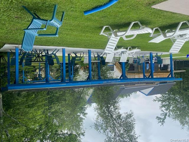 37 Robert Road Kiamesha Lake, NY 12751 - Photo 24 of 25 a view of a house with backyard sitting area and garden