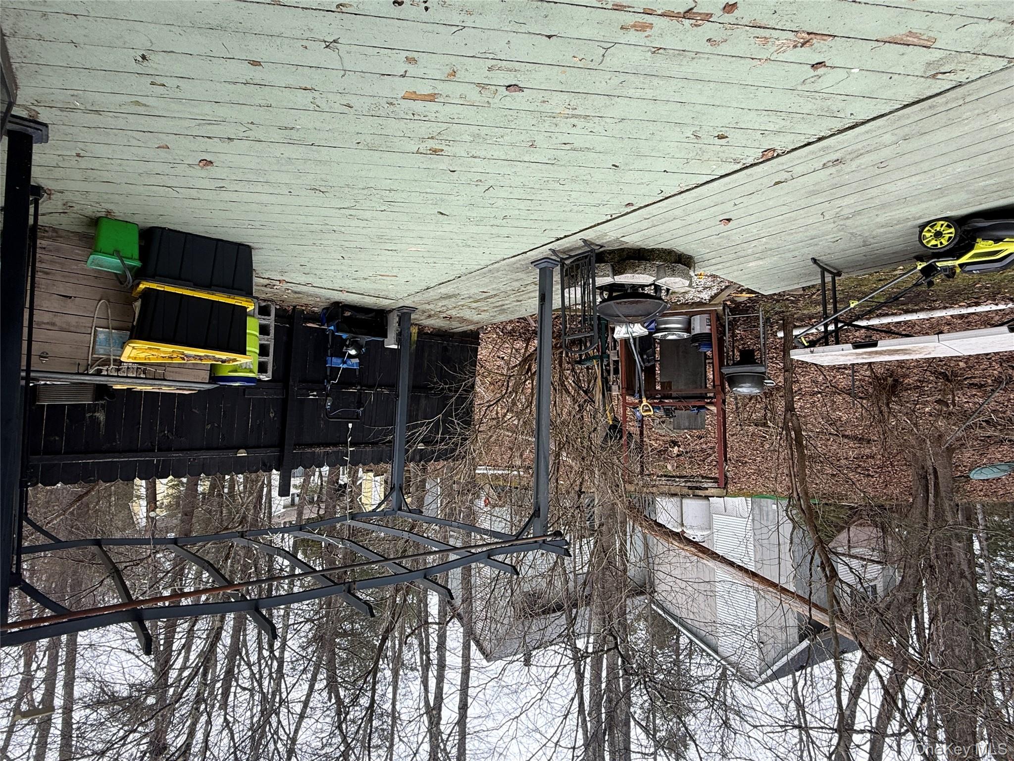 37 Robert Road Kiamesha Lake, NY 12751 - Photo 5 of 25 a swimming pool with outdoor seating