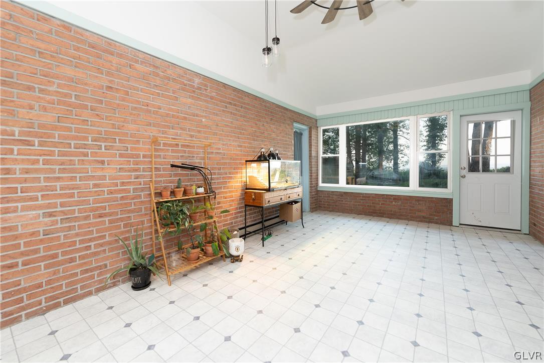 2565 Woods Edge Road Bath, PA 18014 - Photo 13 of 19 Updated Sunroom with cooling & heat.