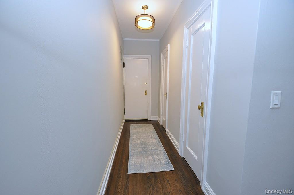 143 Garth Road, Unit 4P Scarsdale, NY 10583 - Photo 27 of 44 Entrance Hallway has two large closets, one cedar walk-in.
