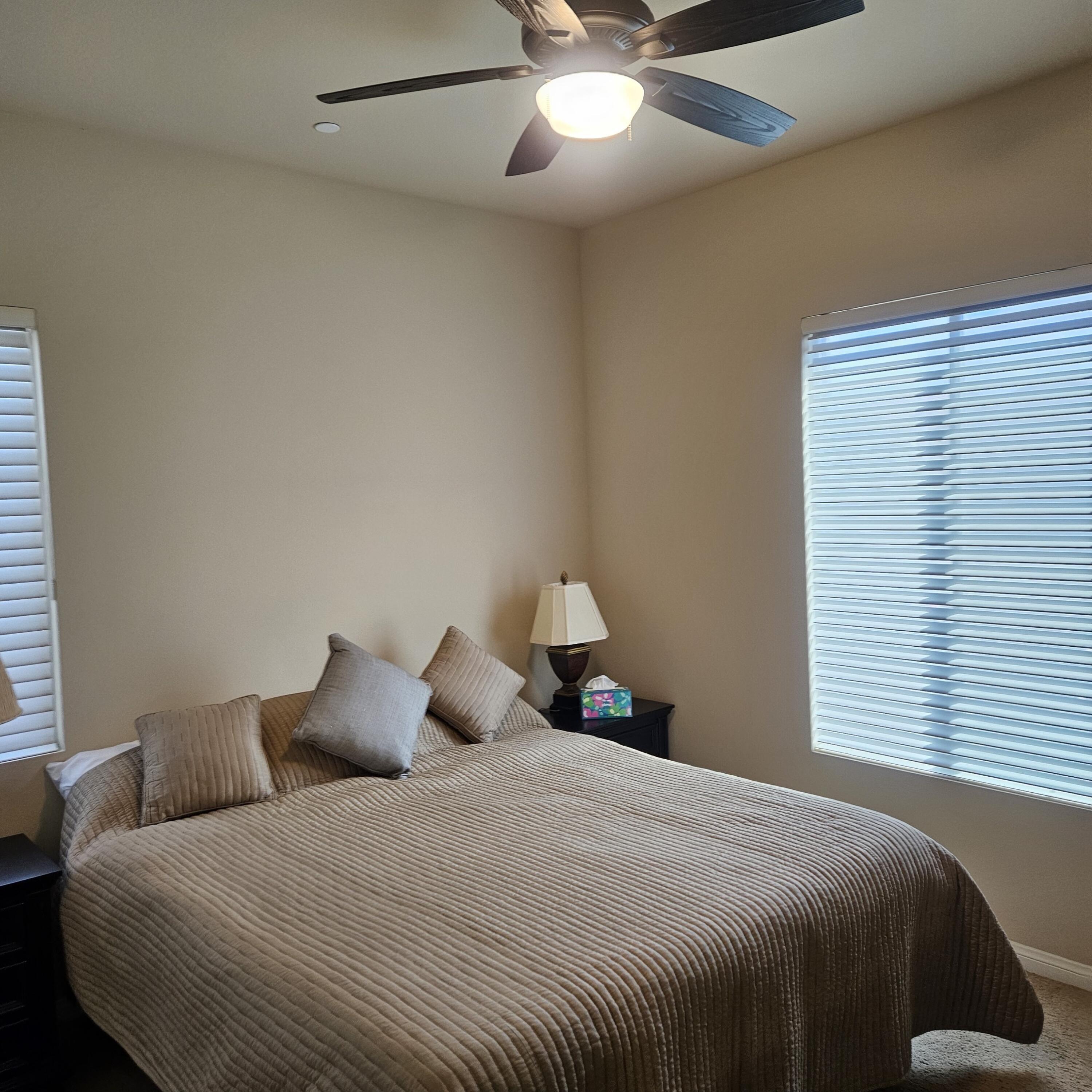 81672 Avenida Viesca Indio, CA 92203 - Photo 11 of 56 a bedroom with a bed and window