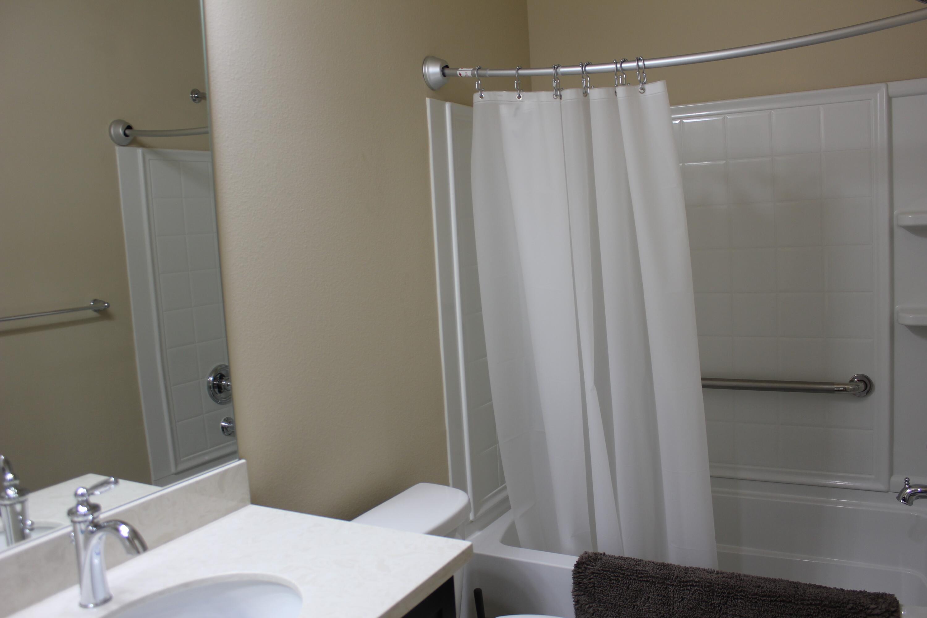 81672 Avenida Viesca Indio, CA 92203 - Photo 14 of 56 a bathroom with a sink and a mirror