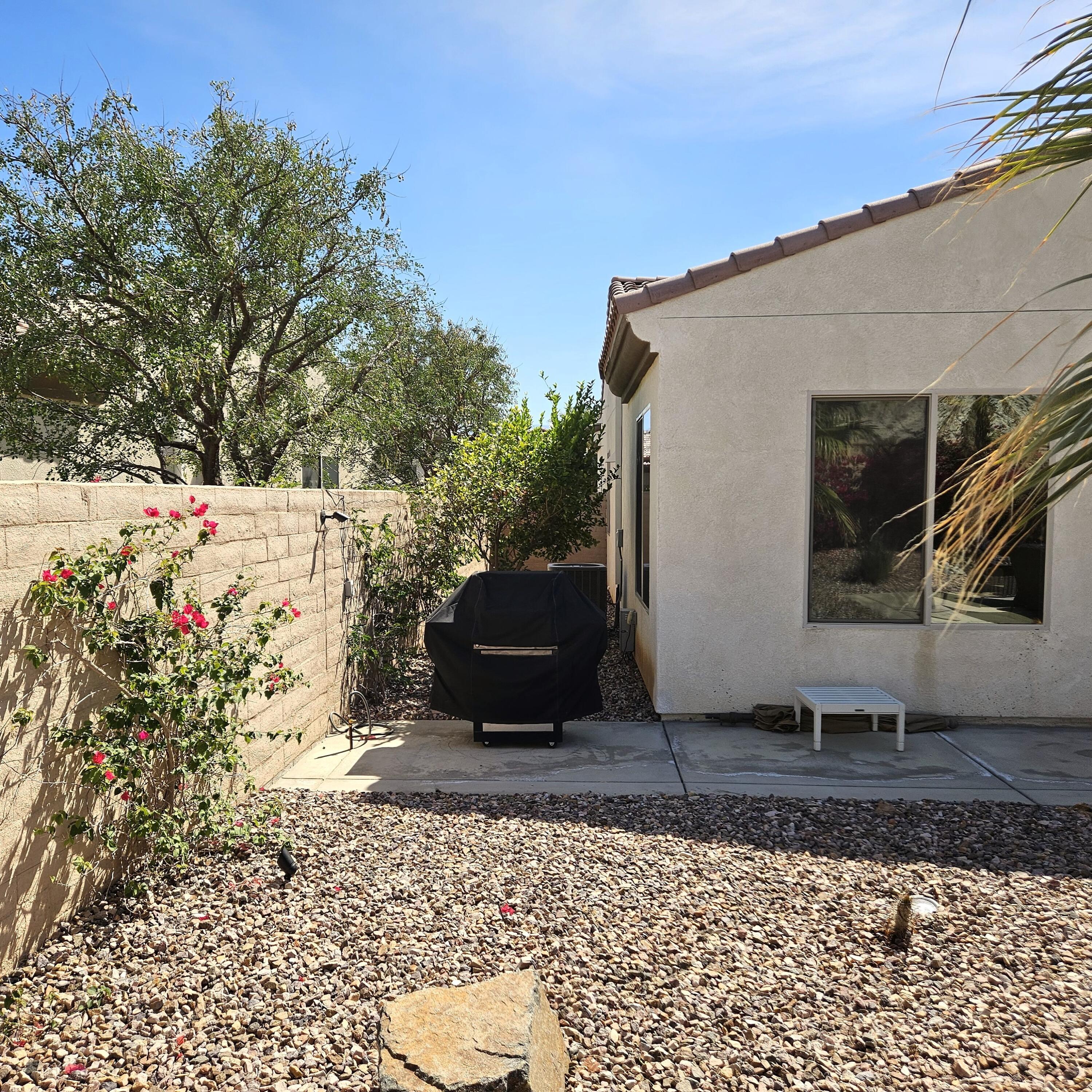 81672 Avenida Viesca Indio, CA 92203 - Photo 25 of 56 a view of a backyard with potted plants
