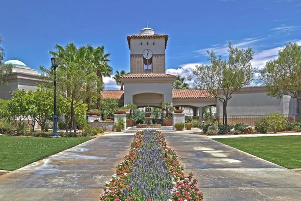 a front view of a building with street view