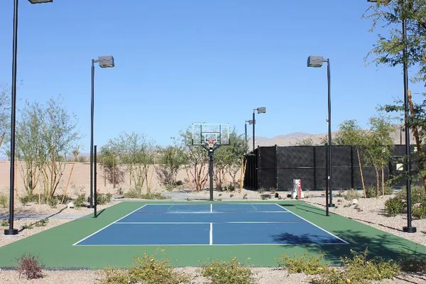 a view of a swimming pool with a yard