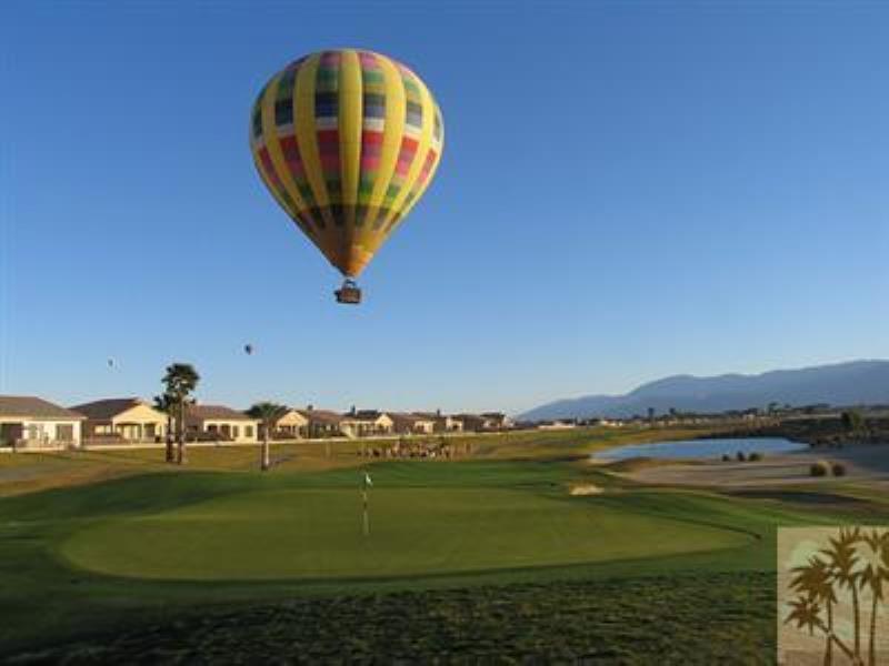 81672 Avenida Viesca Indio, CA 92203 - Photo 55 of 56 a view of a swimming pool with a yard