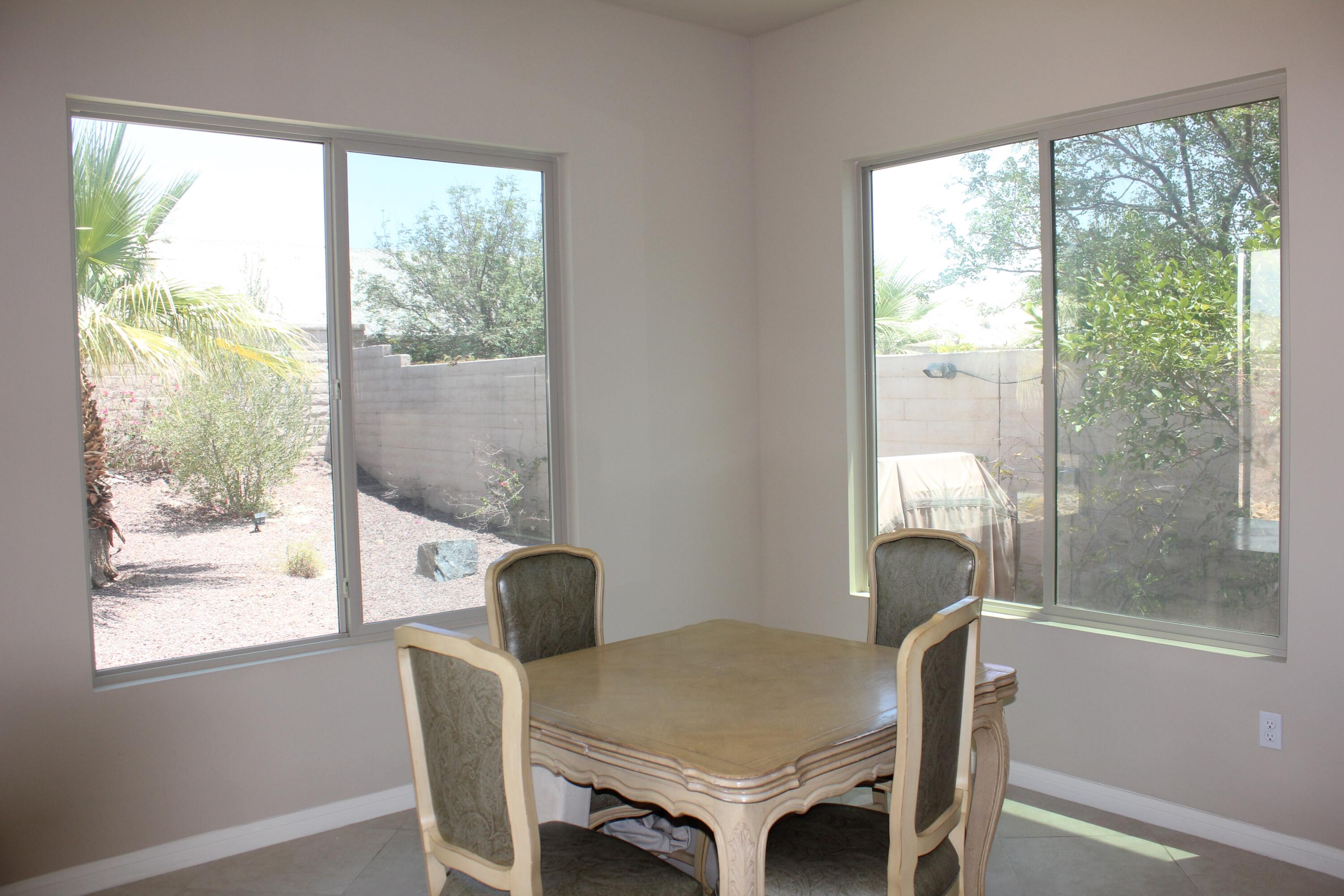 81672 Avenida Viesca Indio, CA 92203 - Photo 6 of 56 a view of a dining room with furniture and a window