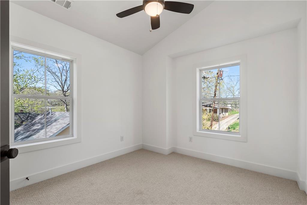 1901 Browns Mill Road Southeast Atlanta, GA 30315 - Photo 29 of 42 a view of an empty room with a window