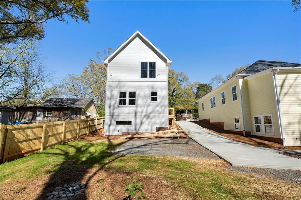 1901 Browns Mill Road Southeast Atlanta, GA 30315 - Photo 42 of 42 a view of a house with a yard