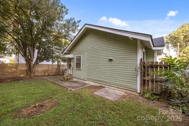 a backyard of a house with entertaining space