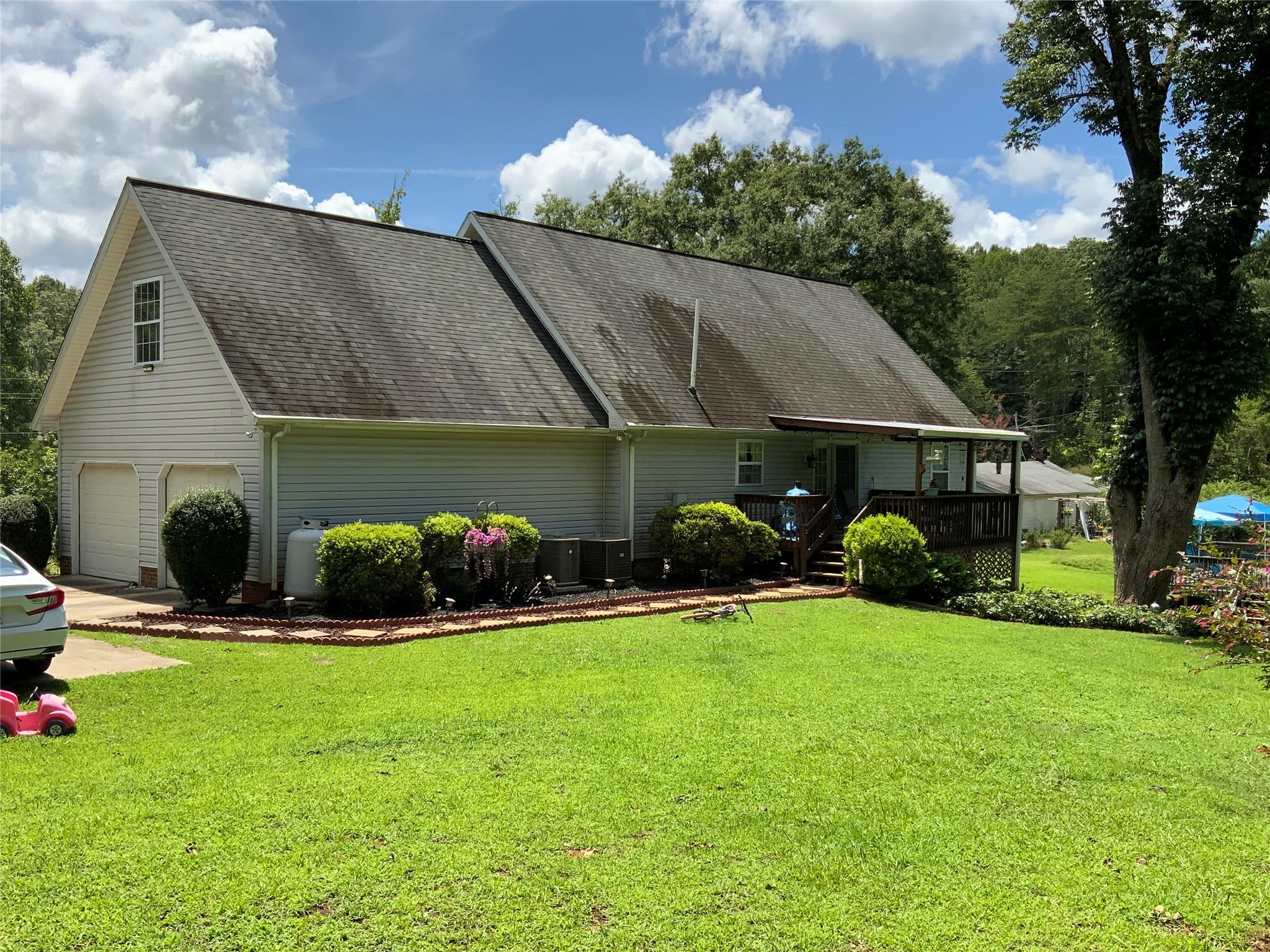 1554 Coopers Gap Road Rutherfordton, NC 28139 - Photo 5 of 27 a view of a house with backyard and sitting area
