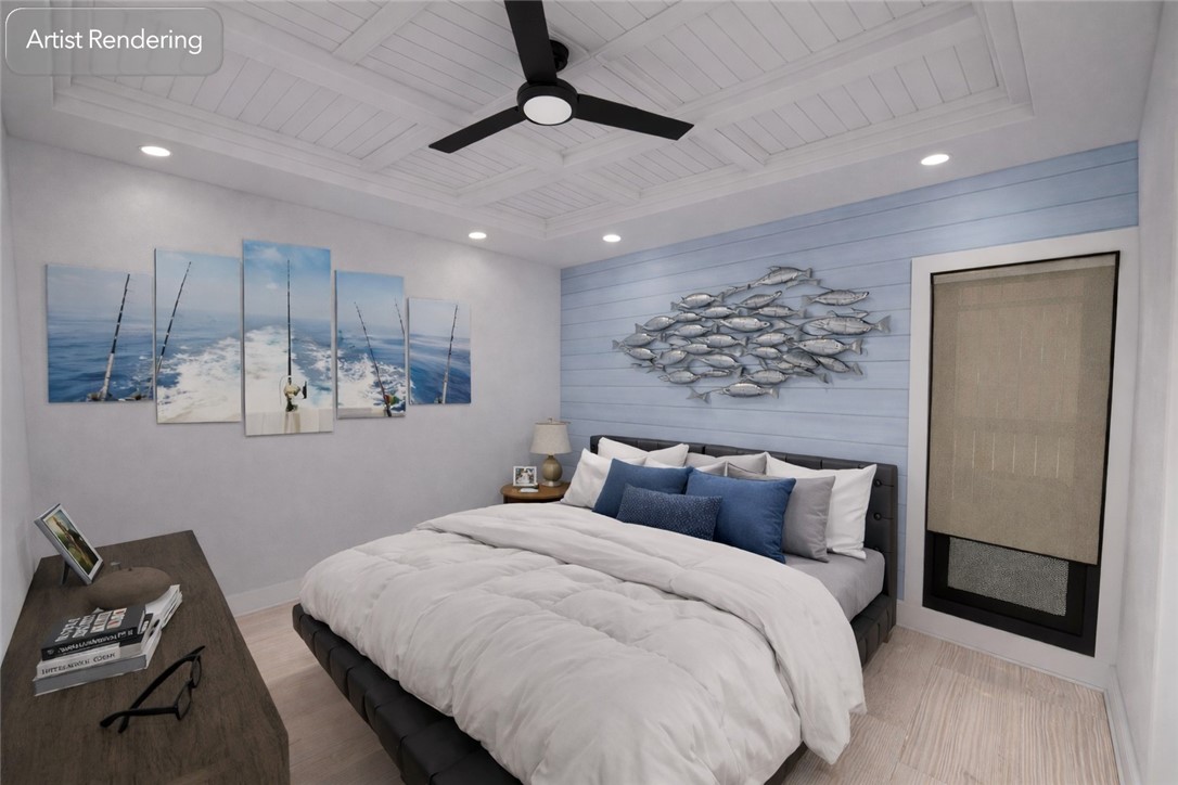 350 Shaver Road, Unit 102 Aransas Pass, TX 78336 - Photo 3 of 19 a bedroom with a bed and a chandelier