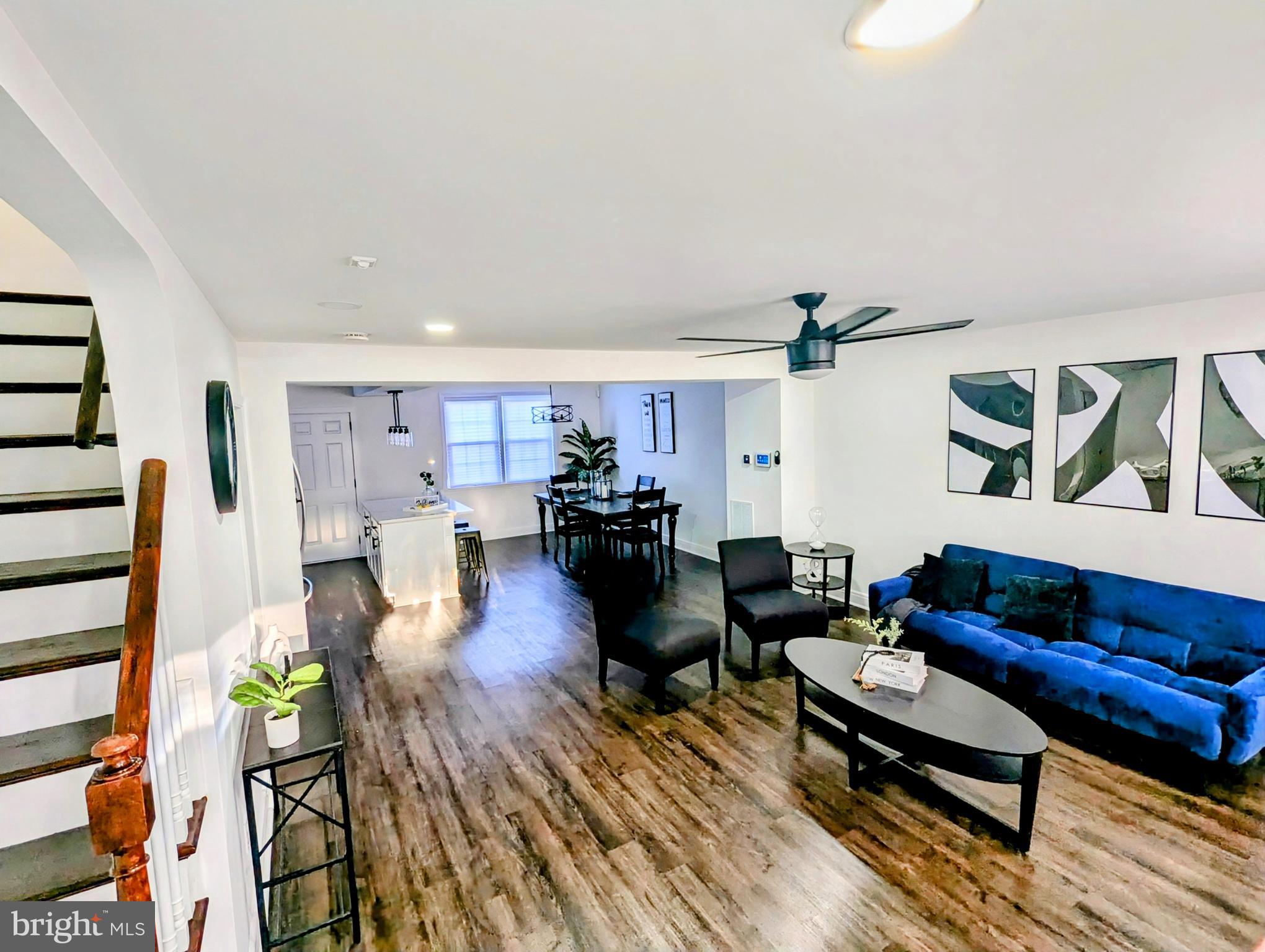 809 Wedgewood Road Baltimore, MD 21229 - Photo 3 of 36 a living room with furniture and wooden floor