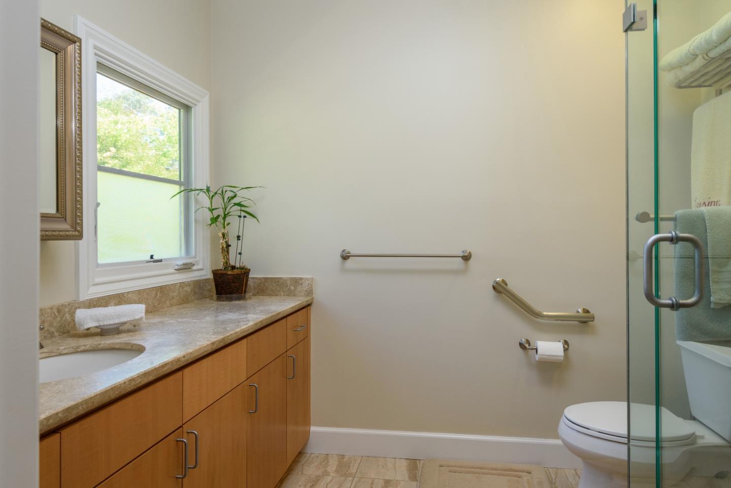 1120 Southdown Road Hillsborough, CA 94010 - Photo 15 of 28 a bathroom with a granite countertop sink toilet and a mirror