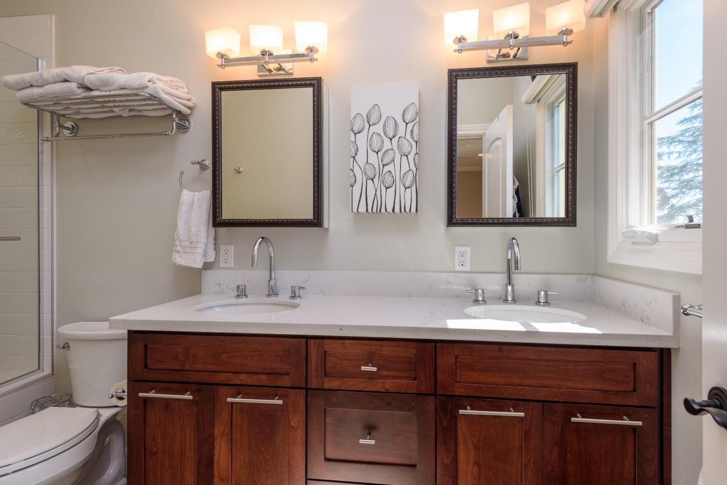 1120 Southdown Road Hillsborough, CA 94010 - Photo 17 of 28 a bathroom with a sink vanity and a toilet
