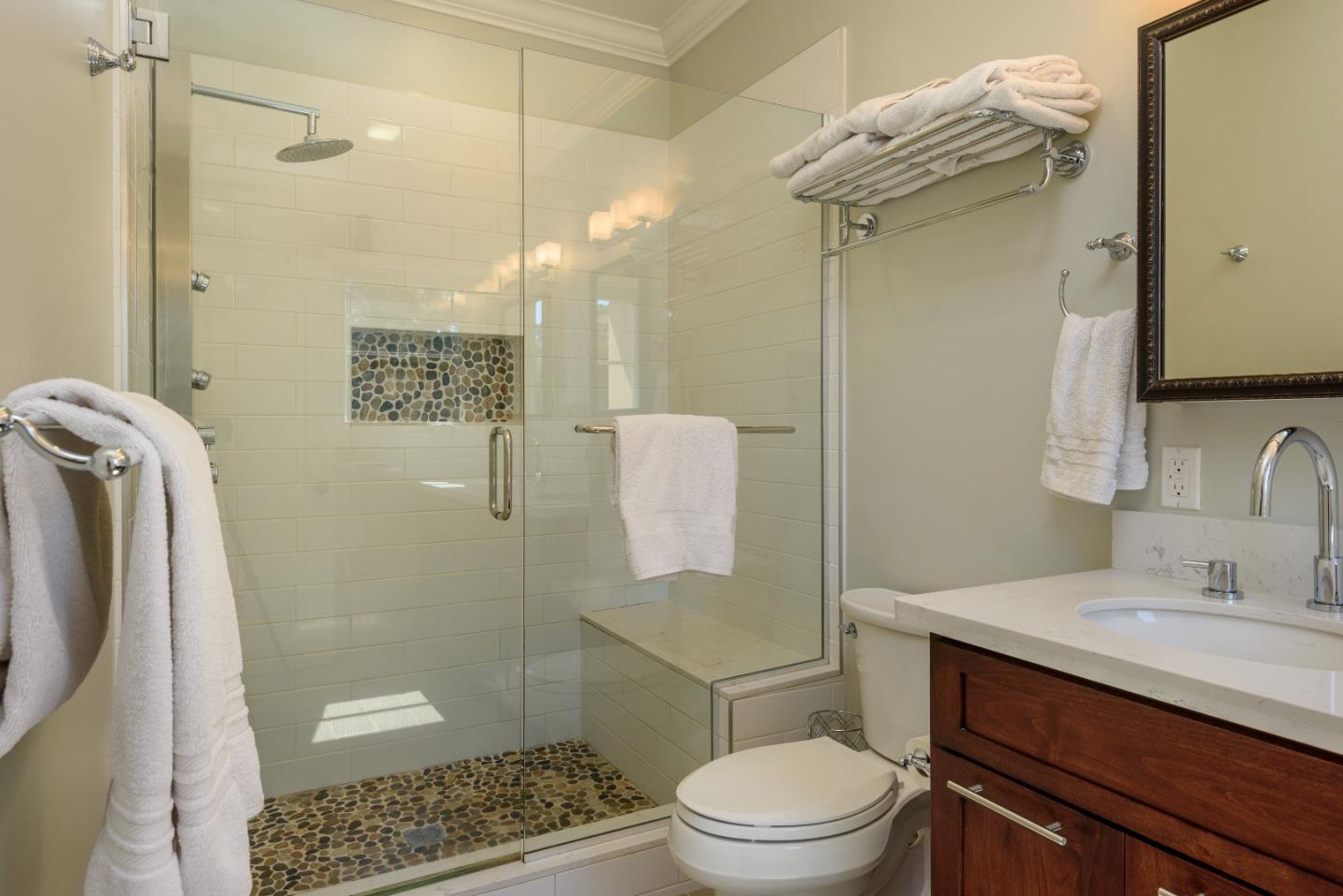 1120 Southdown Road Hillsborough, CA 94010 - Photo 18 of 28 a bathroom with a sink a toilet and shower