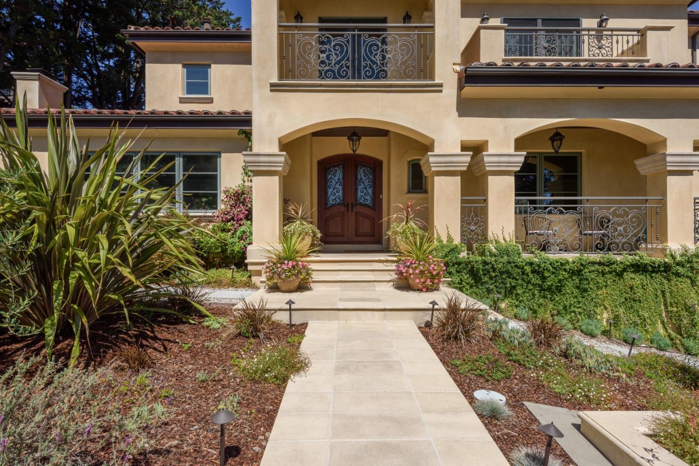 1120 Southdown Road Hillsborough, CA 94010 - Photo 2 of 28 a front view of a house with garden