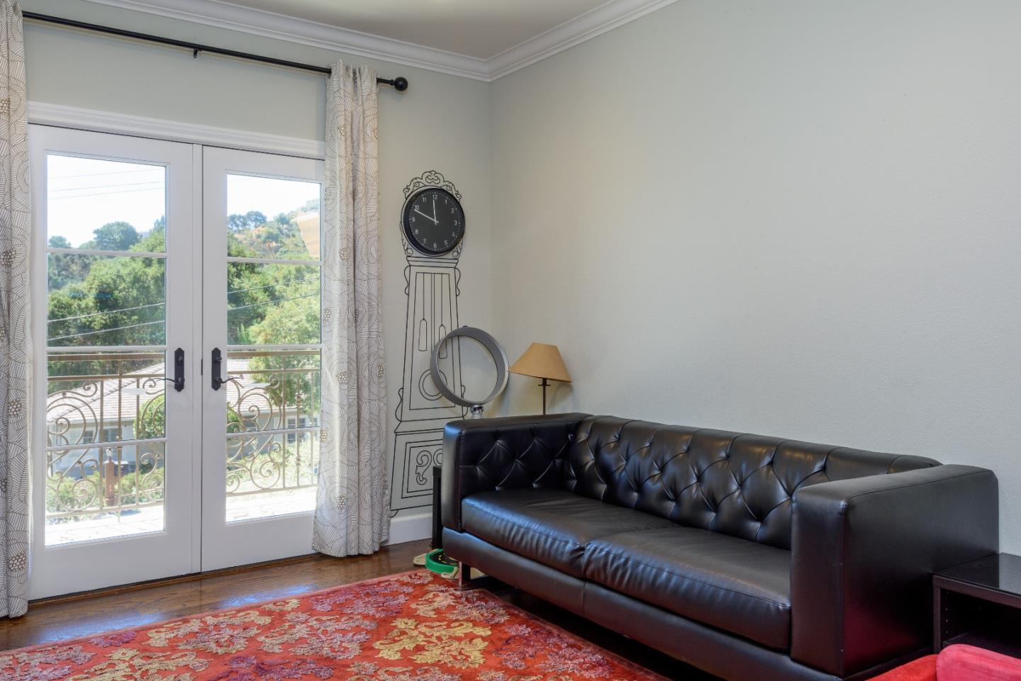 1120 Southdown Road Hillsborough, CA 94010 - Photo 22 of 28 a living room with furniture and a window