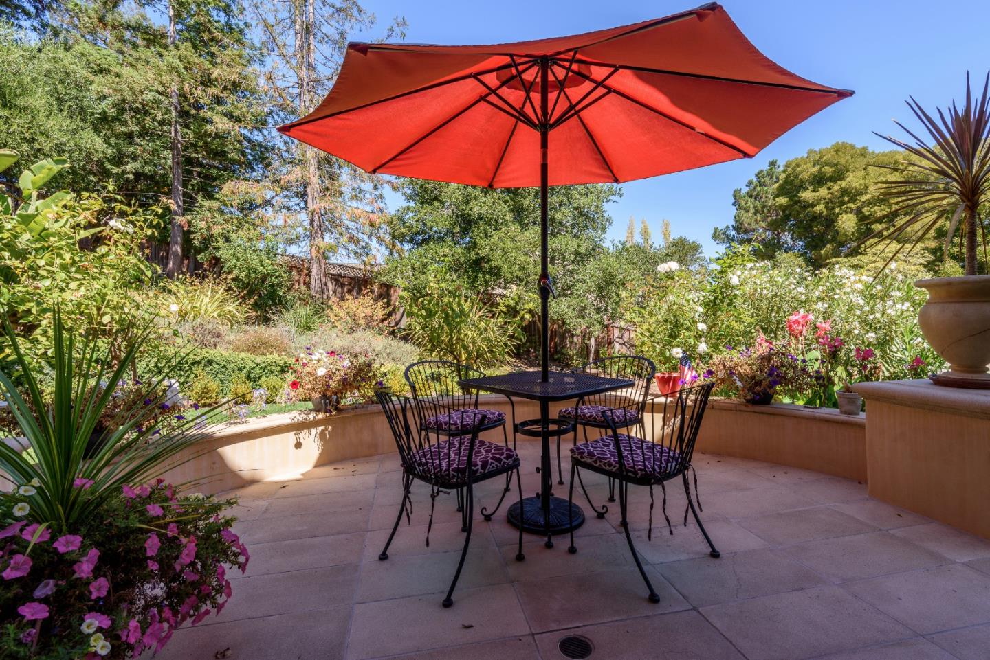 1120 Southdown Road Hillsborough, CA 94010 - Photo 23 of 28 a view of an outdoor sitting area with furniture and umbrella