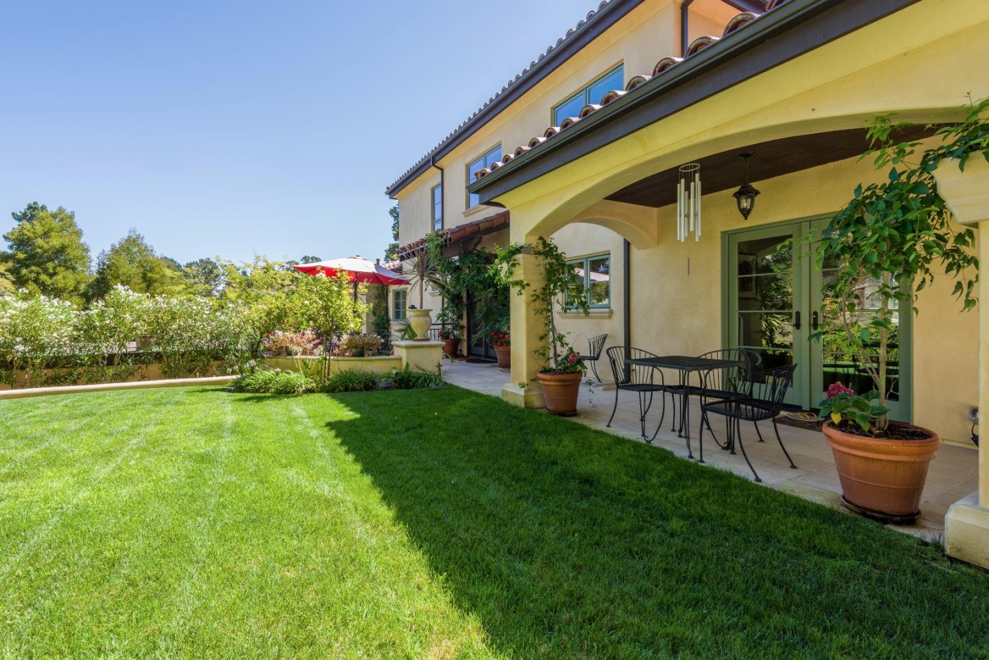 1120 Southdown Road Hillsborough, CA 94010 - Photo 24 of 28 a view of a chair and tables in the garden