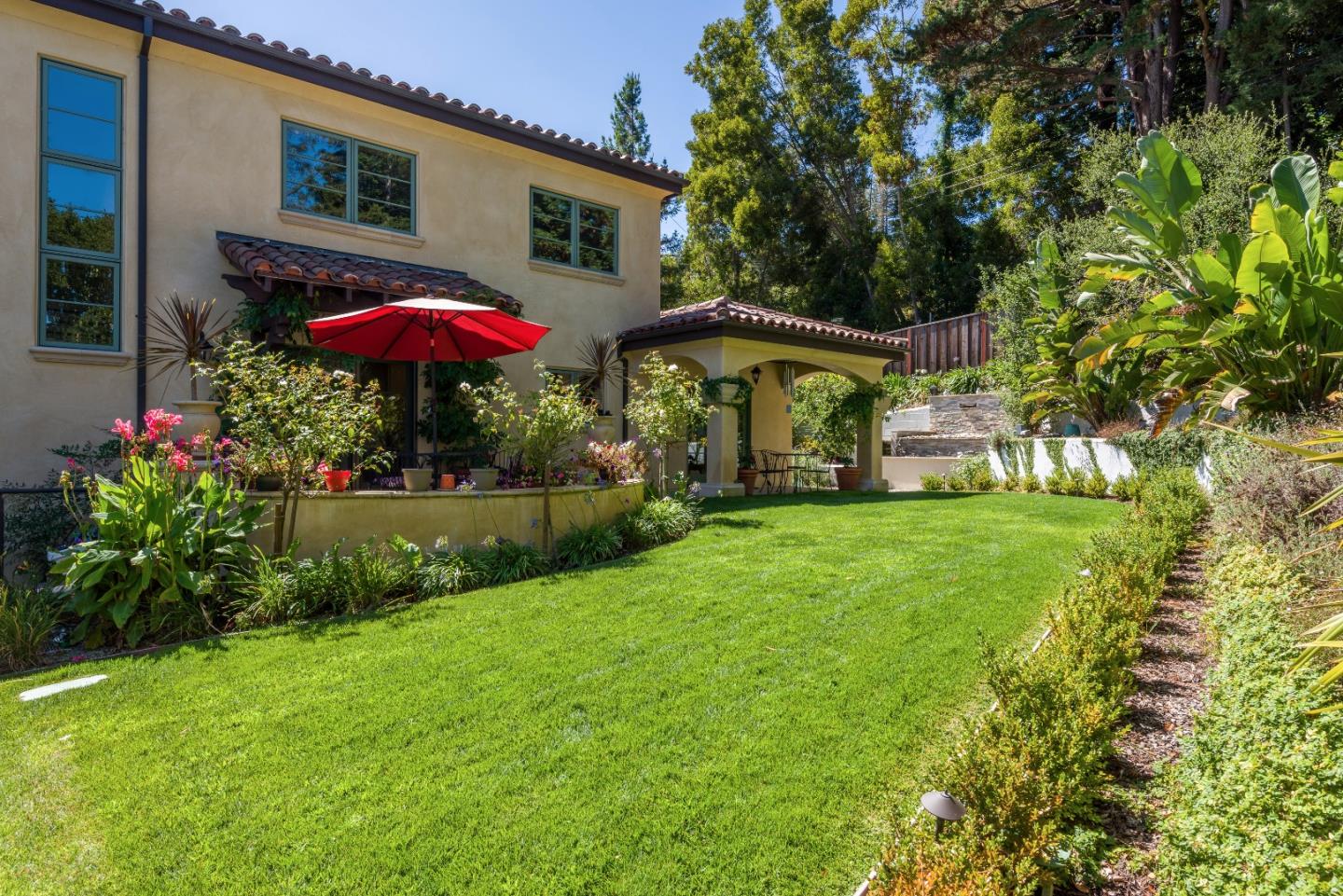 1120 Southdown Road Hillsborough, CA 94010 - Photo 25 of 28 a view of a house with a yard and sitting area