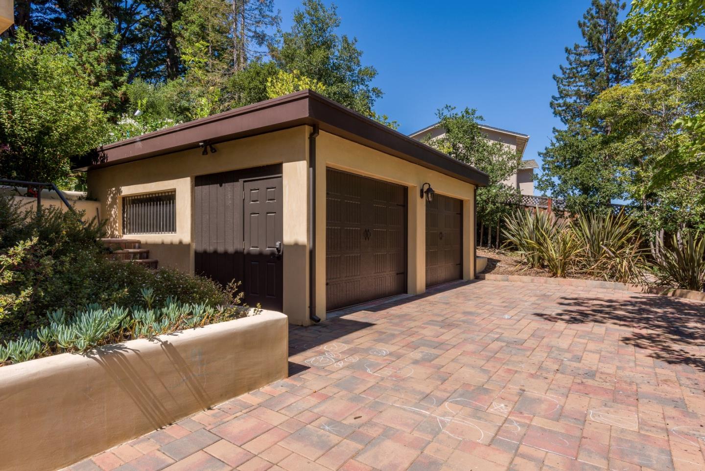 1120 Southdown Road Hillsborough, CA 94010 - Photo 28 of 28 a front view of a house with a yard
