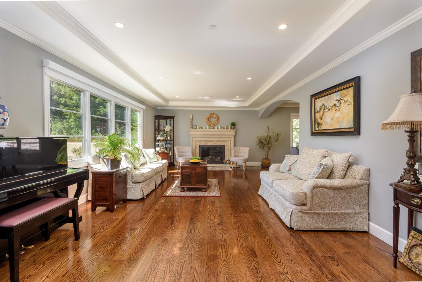 1120 Southdown Road Hillsborough, CA 94010 - Photo 3 of 28 a living room with furniture and a flat screen tv