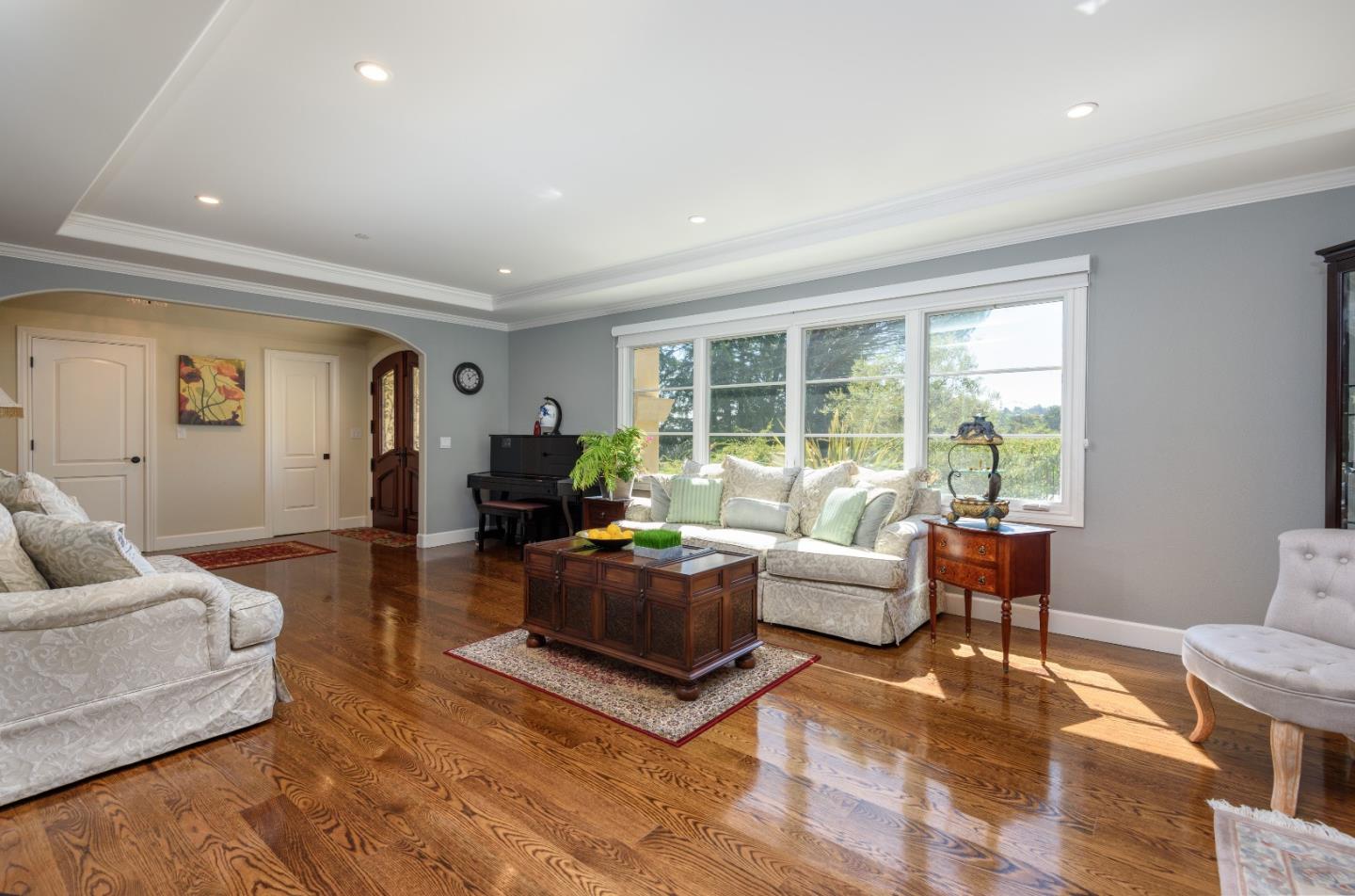 1120 Southdown Road Hillsborough, CA 94010 - Photo 4 of 28 a living room with furniture and a large window