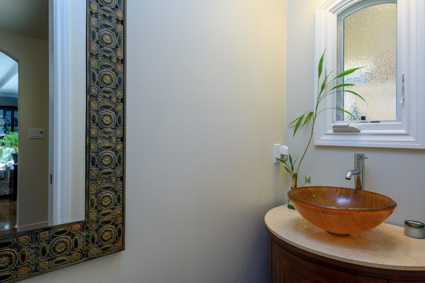 1120 Southdown Road Hillsborough, CA 94010 - Photo 6 of 28 a bathroom with a sink and a mirror