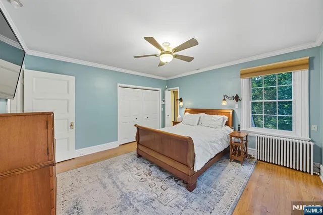 a bed room with a bed and a window