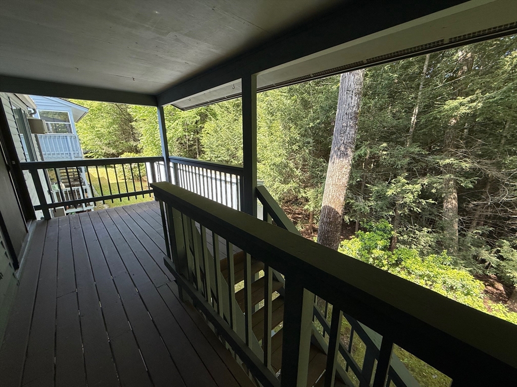 28 Maria Avenue, Unit C Southbridge, MA 01550 - Photo 10 of 11 a view of balcony with wooden floor
