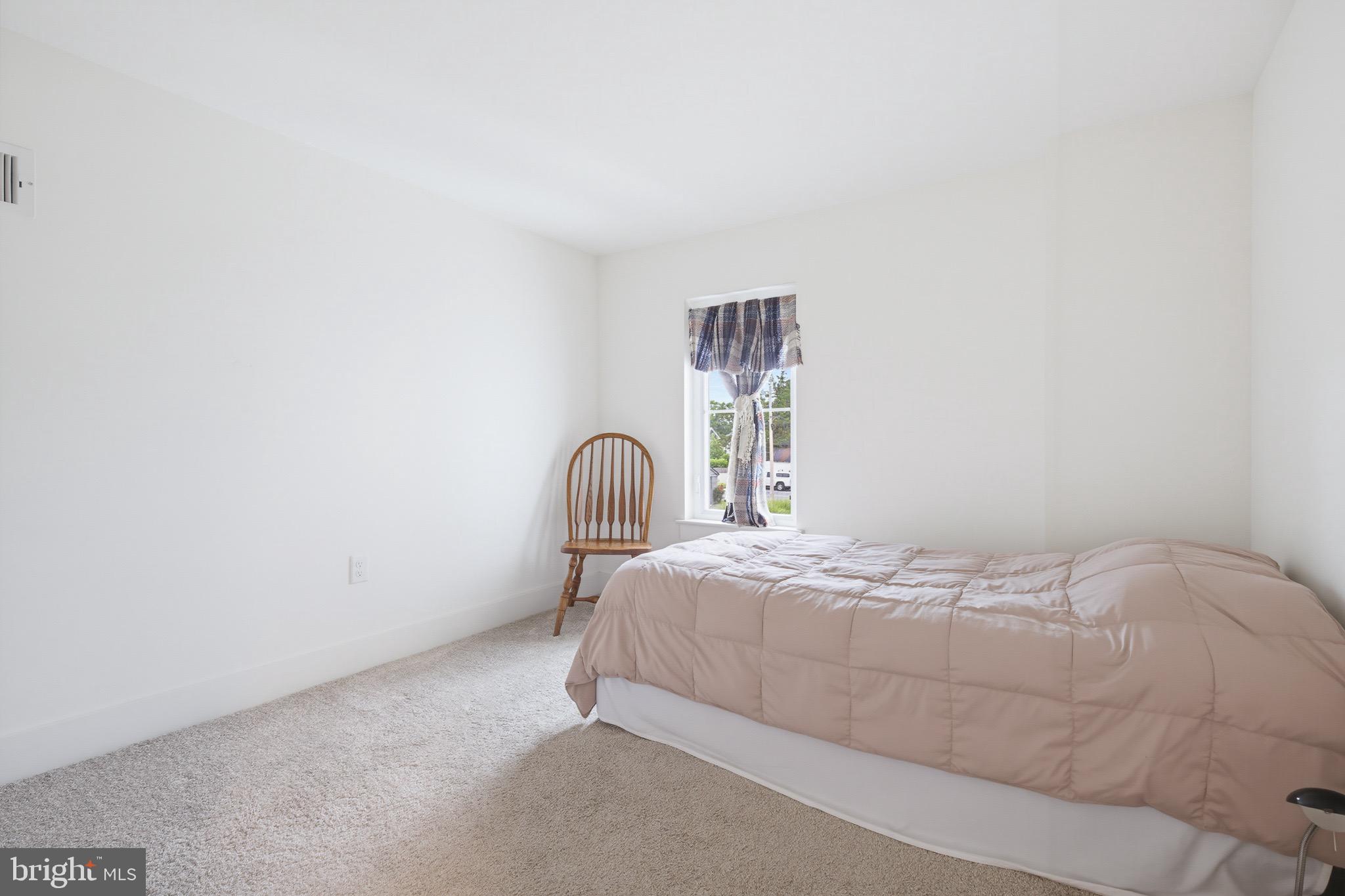 20 Willow Street Lititz, PA 17543 - Photo 30 of 44 a bedroom with a bed and window