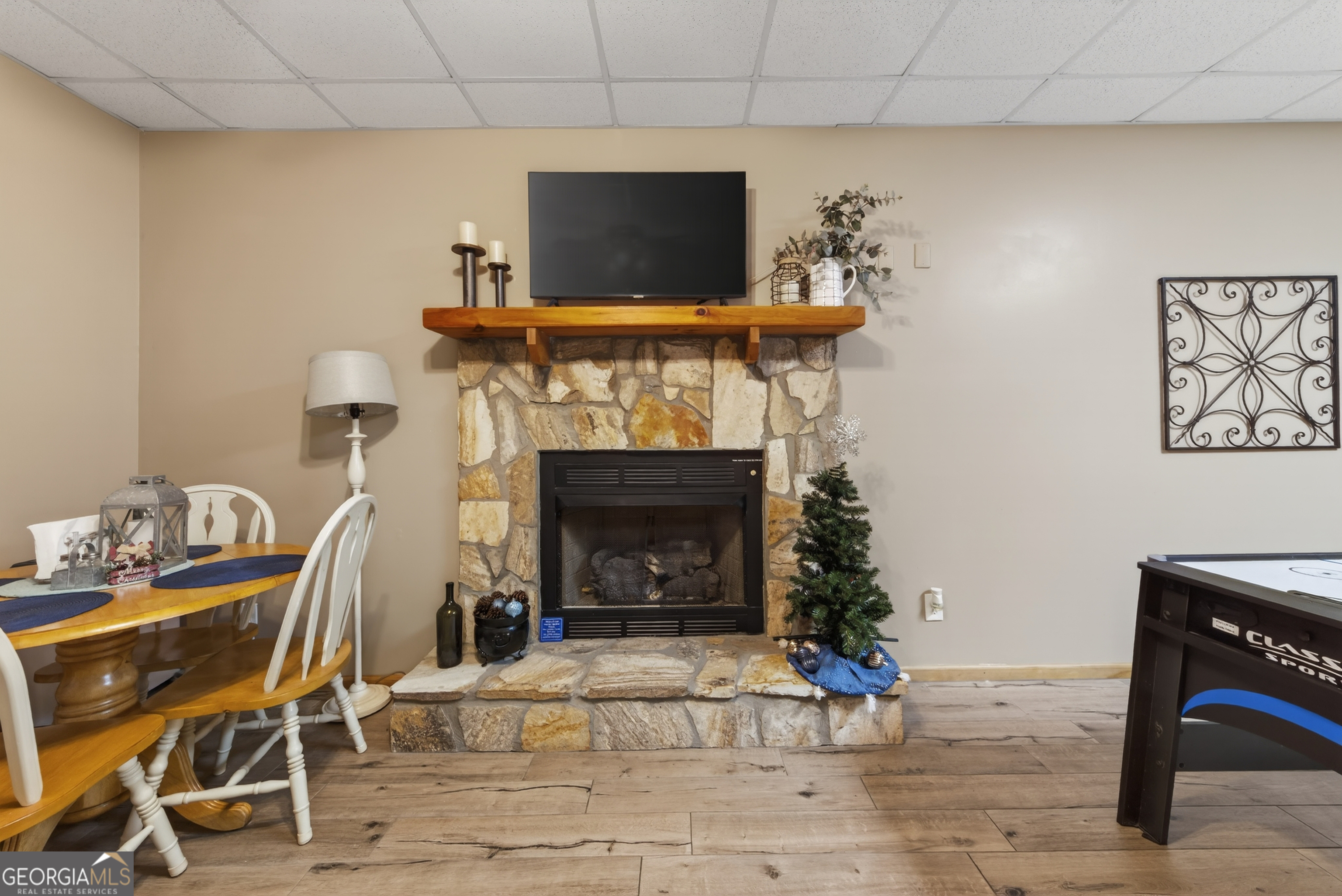 697 Zeppelin Strasse Helen, GA 30545 - Photo 32 of 56 a living room with furniture and a fireplace