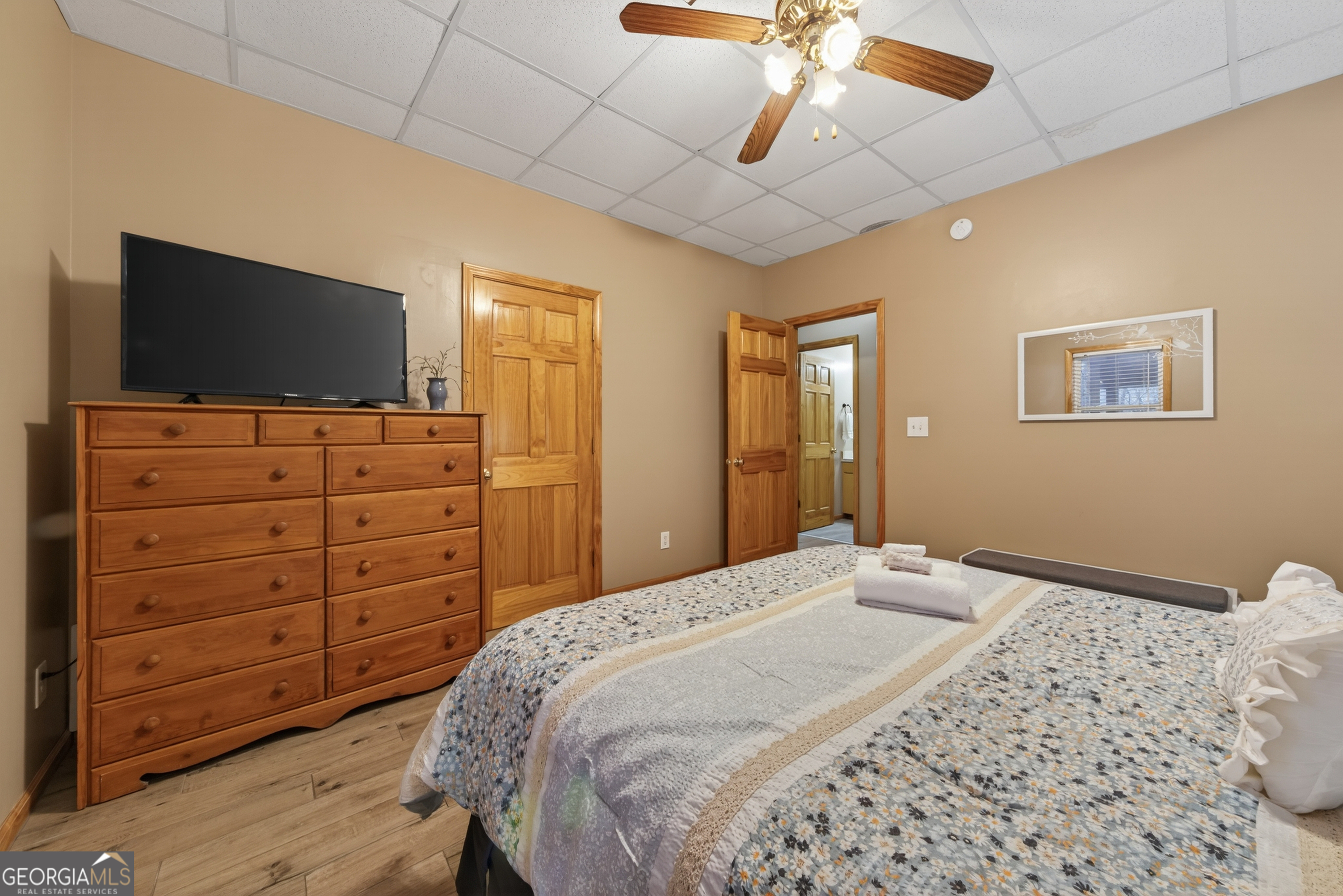 697 Zeppelin Strasse Helen, GA 30545 - Photo 38 of 56 a bedroom with a bed and a flat screen tv