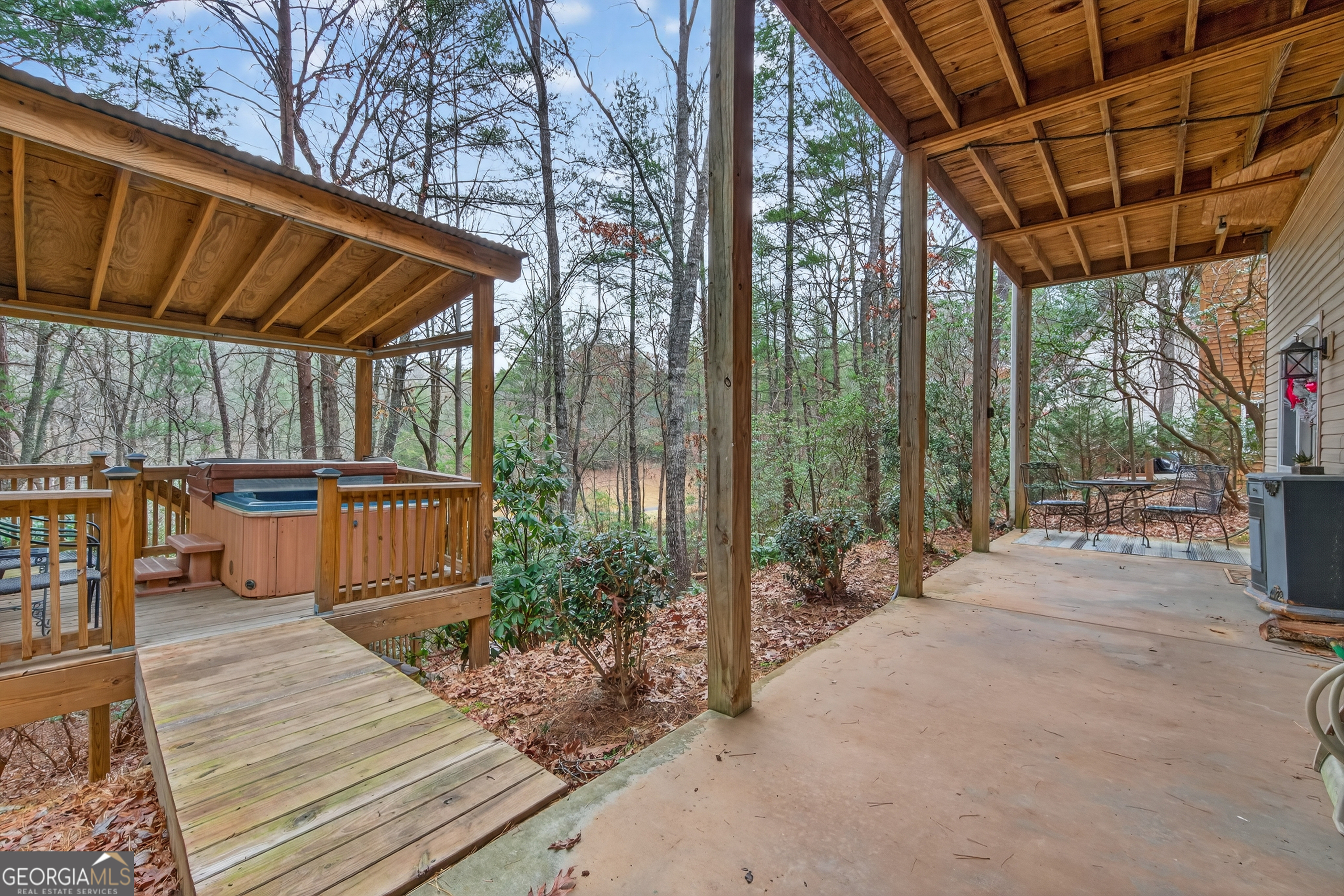 697 Zeppelin Strasse Helen, GA 30545 - Photo 42 of 56 a view of backyard with plants and outdoor seating