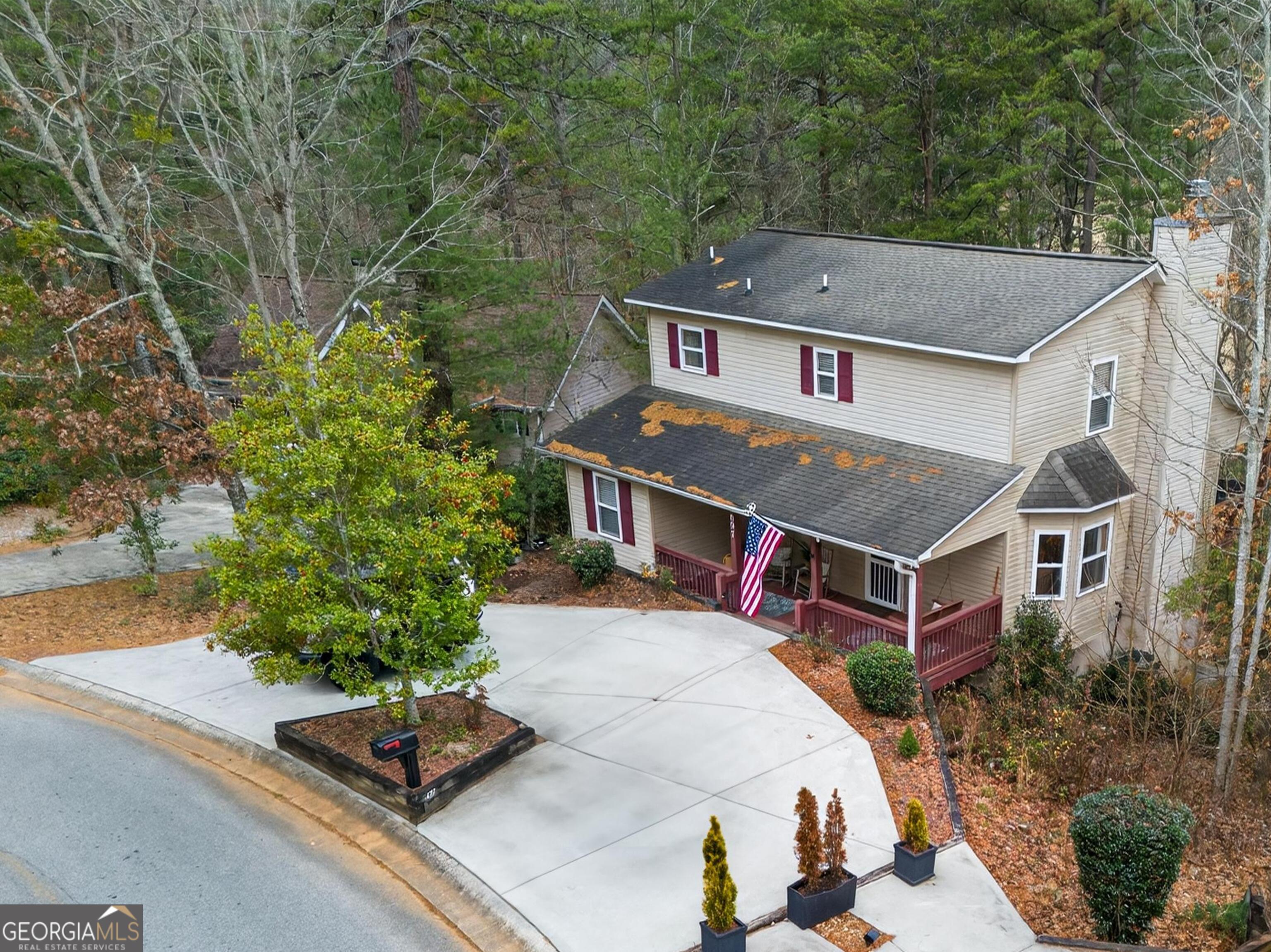 697 Zeppelin Strasse Helen, GA 30545 - Photo 47 of 56 a aerial view of a house with a yard table and chairs