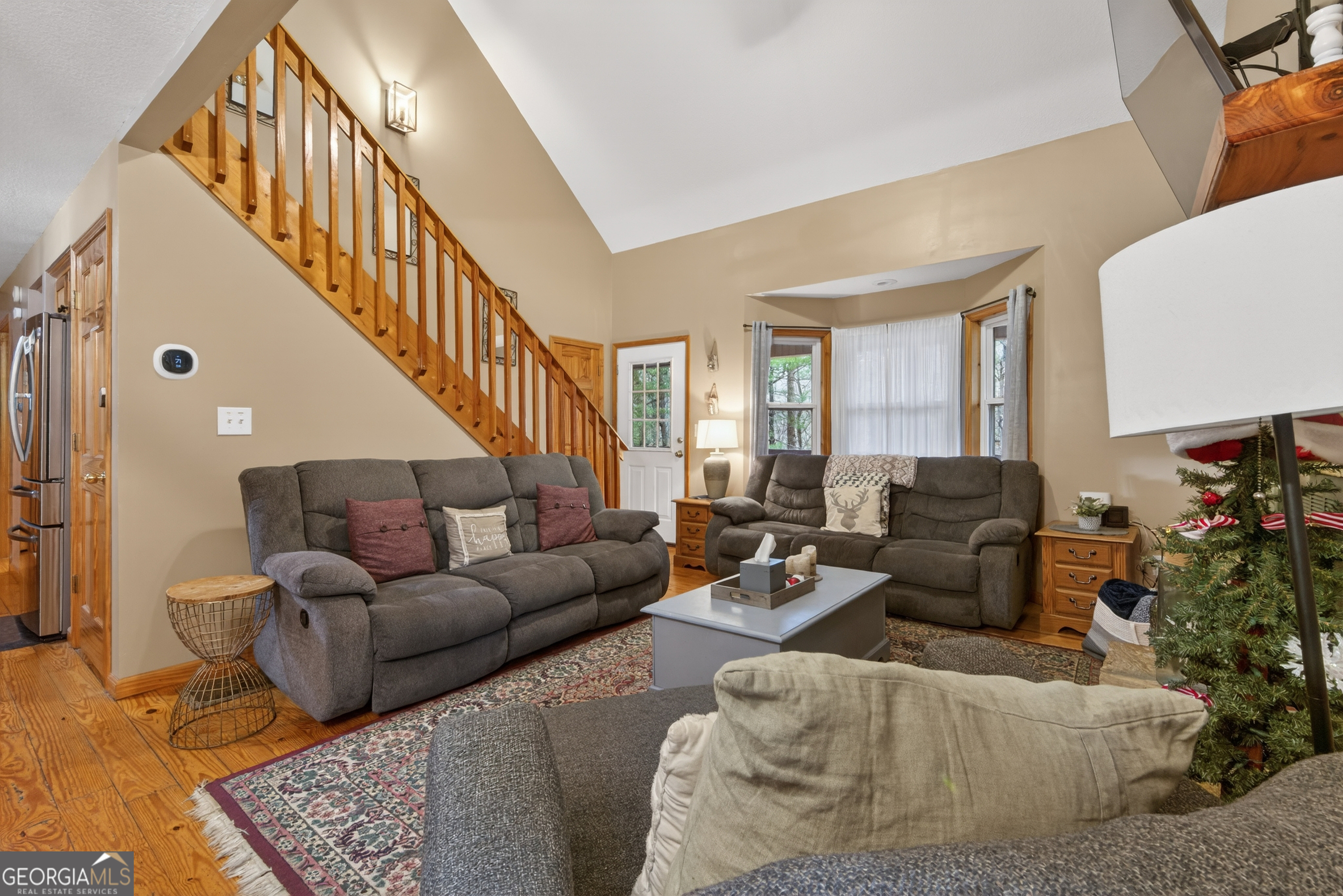 697 Zeppelin Strasse Helen, GA 30545 - Photo 8 of 56 a living room with furniture or couch and a potted plant