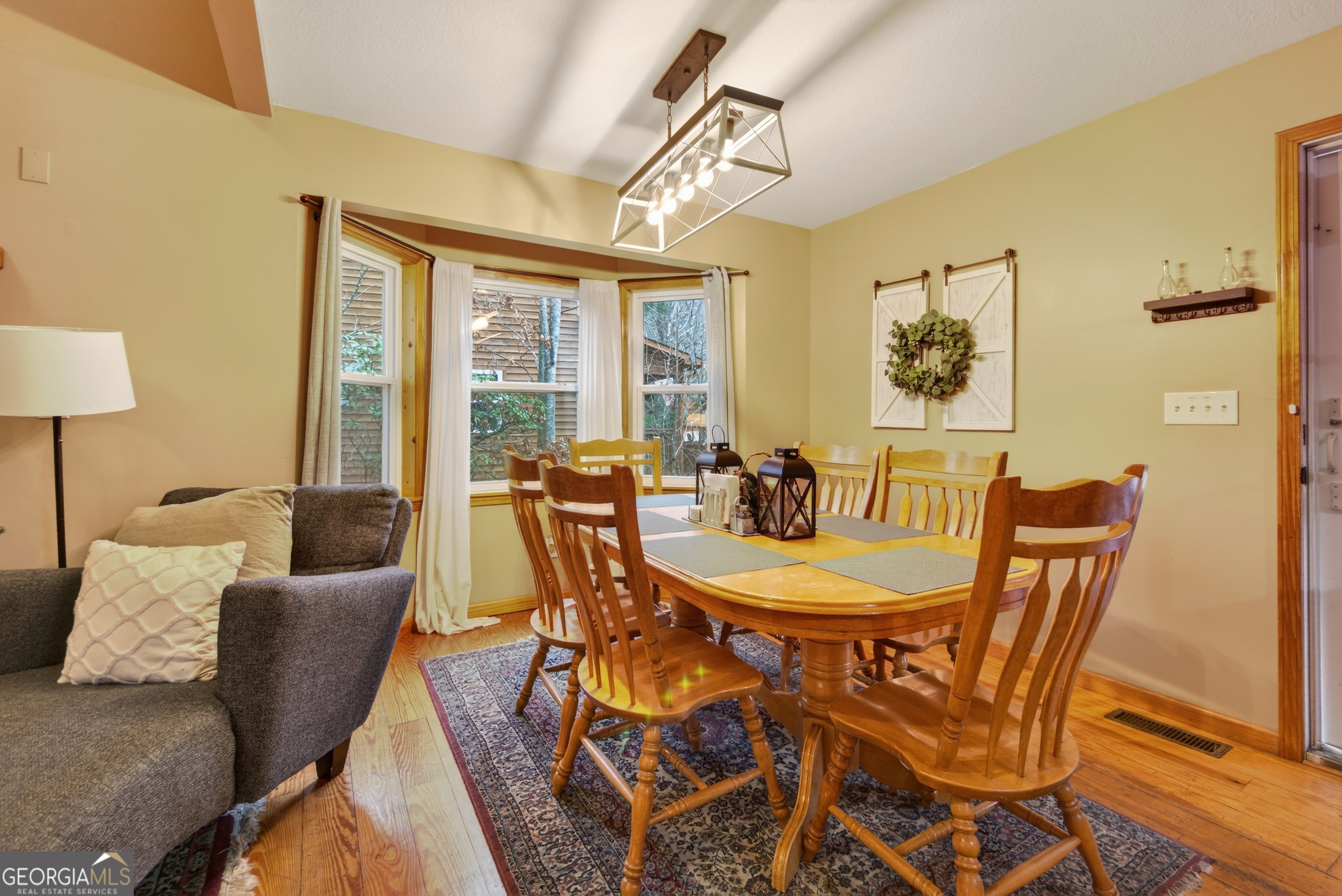 697 Zeppelin Strasse Helen, GA 30545 - Photo 10 of 56 a view of a dining room with furniture window and outside view