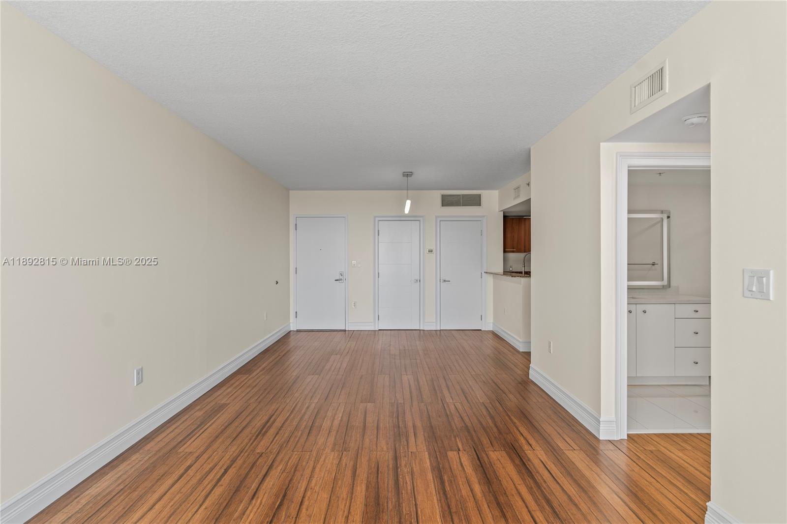 9055 Southwest 73rd Court, Unit 1502 Miami, FL 33156 - Photo 16 of 41 a view of a room with wooden floor