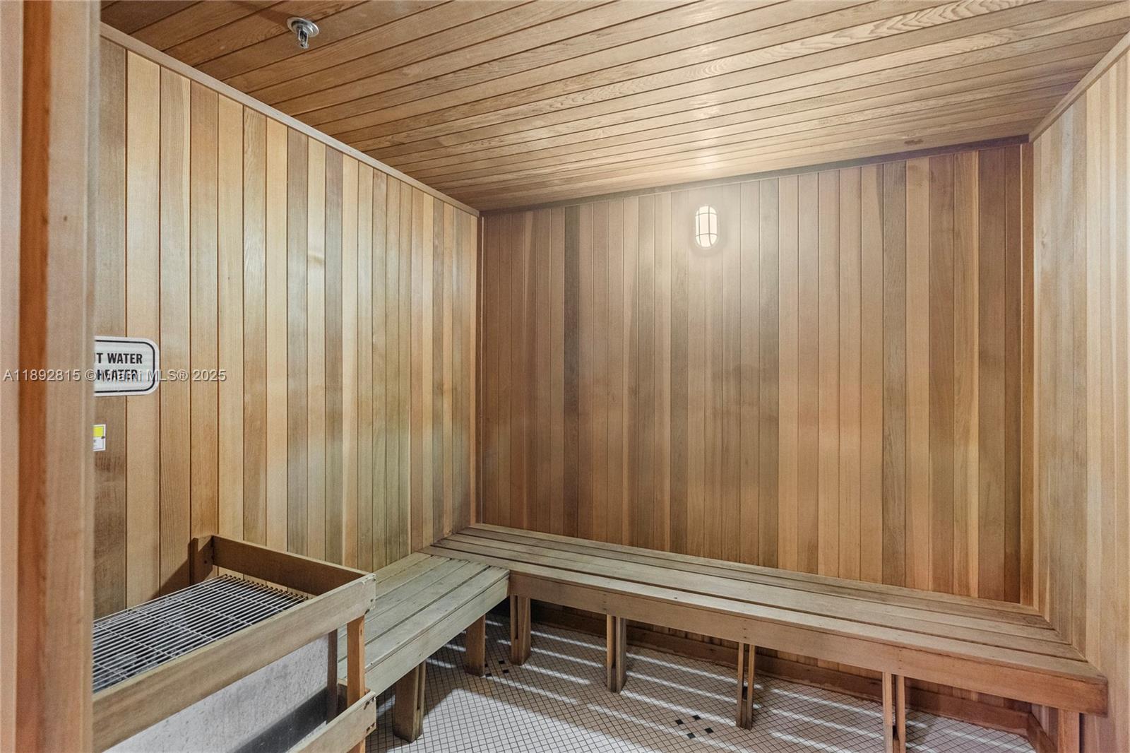 9055 Southwest 73rd Court, Unit 1502 Miami, FL 33156 - Photo 27 of 41 a bathroom with a window and a shower