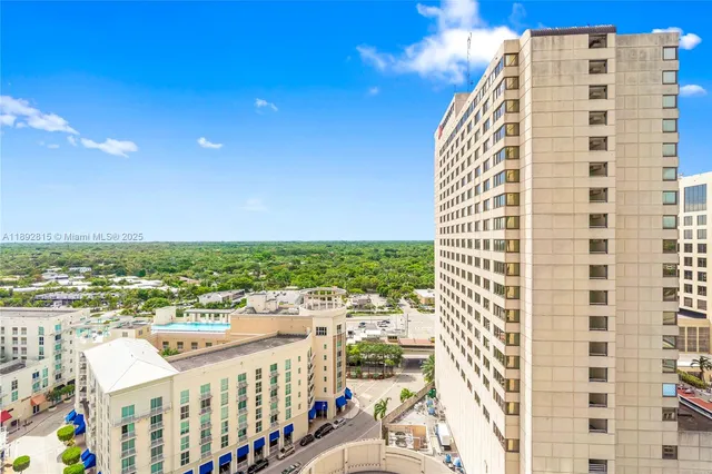 a view of a city with tall buildings