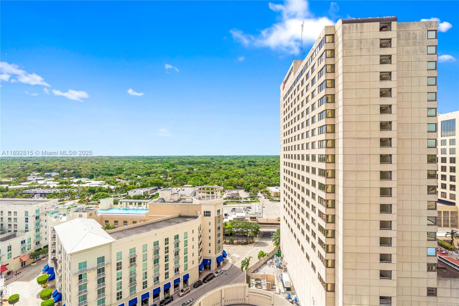 9055 Southwest 73rd Court, Unit 1502 Miami, FL 33156 - Photo 31 of 41 a view of a city with tall buildings